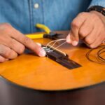 How to Put On a Guitar Strap