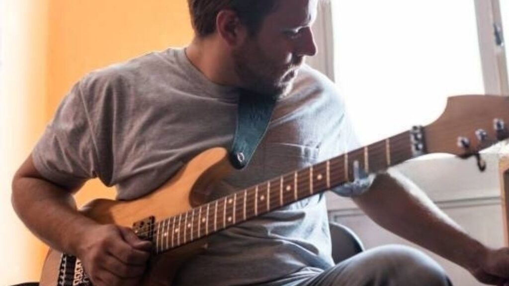 How to Put On a Guitar Strap