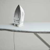 how to close an ironing board